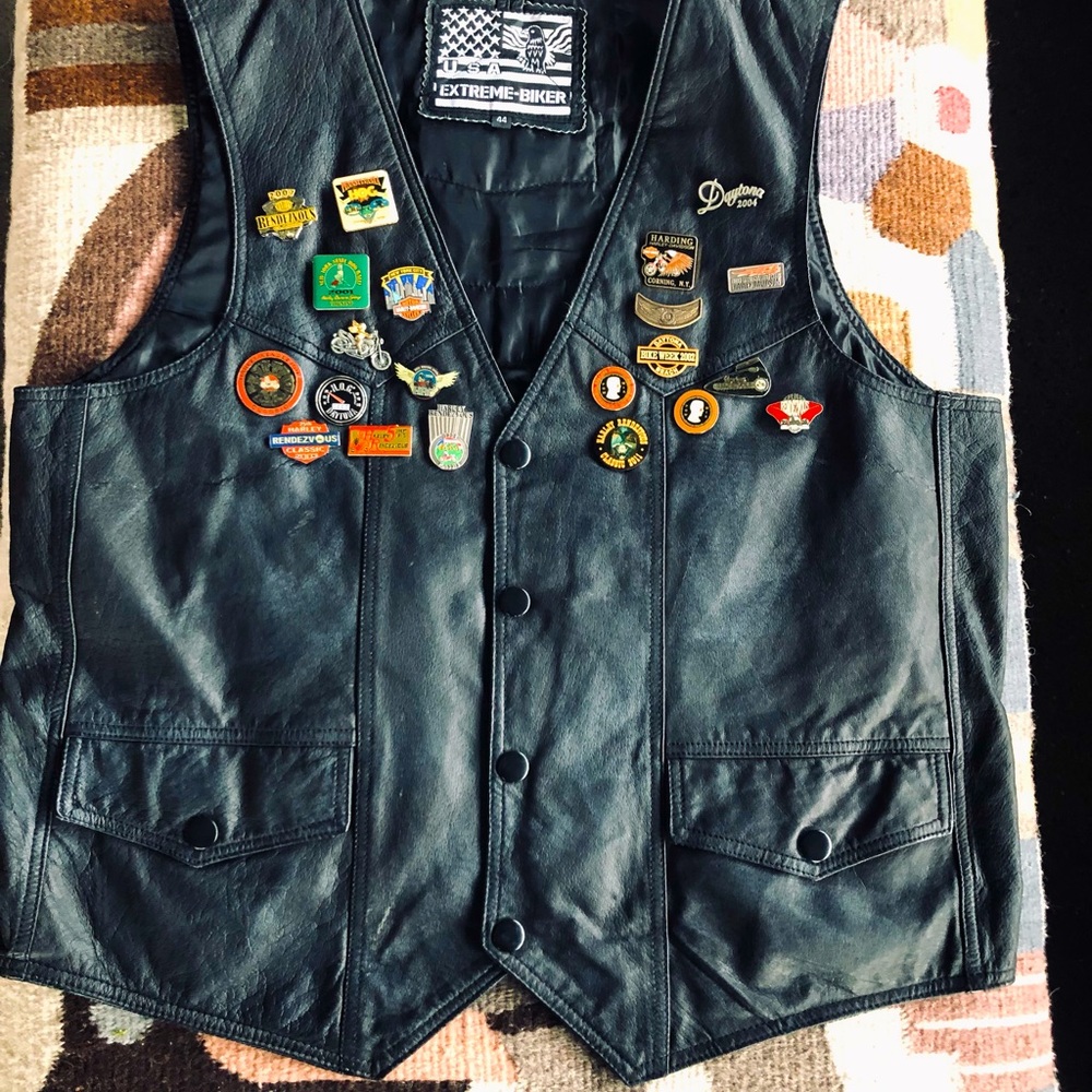 Extreme Biker Leather Vest. It has multiple pins from previous owner